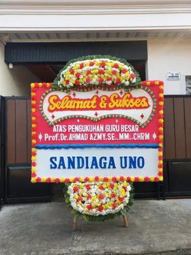 Papan Bunga Opening pemurus luar