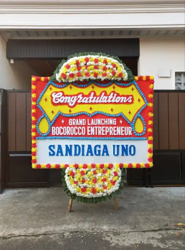 Papan Bunga Opening pemurus luar